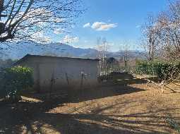 Contemporary property with magnificent mountain views in tranquil setting close to a village 